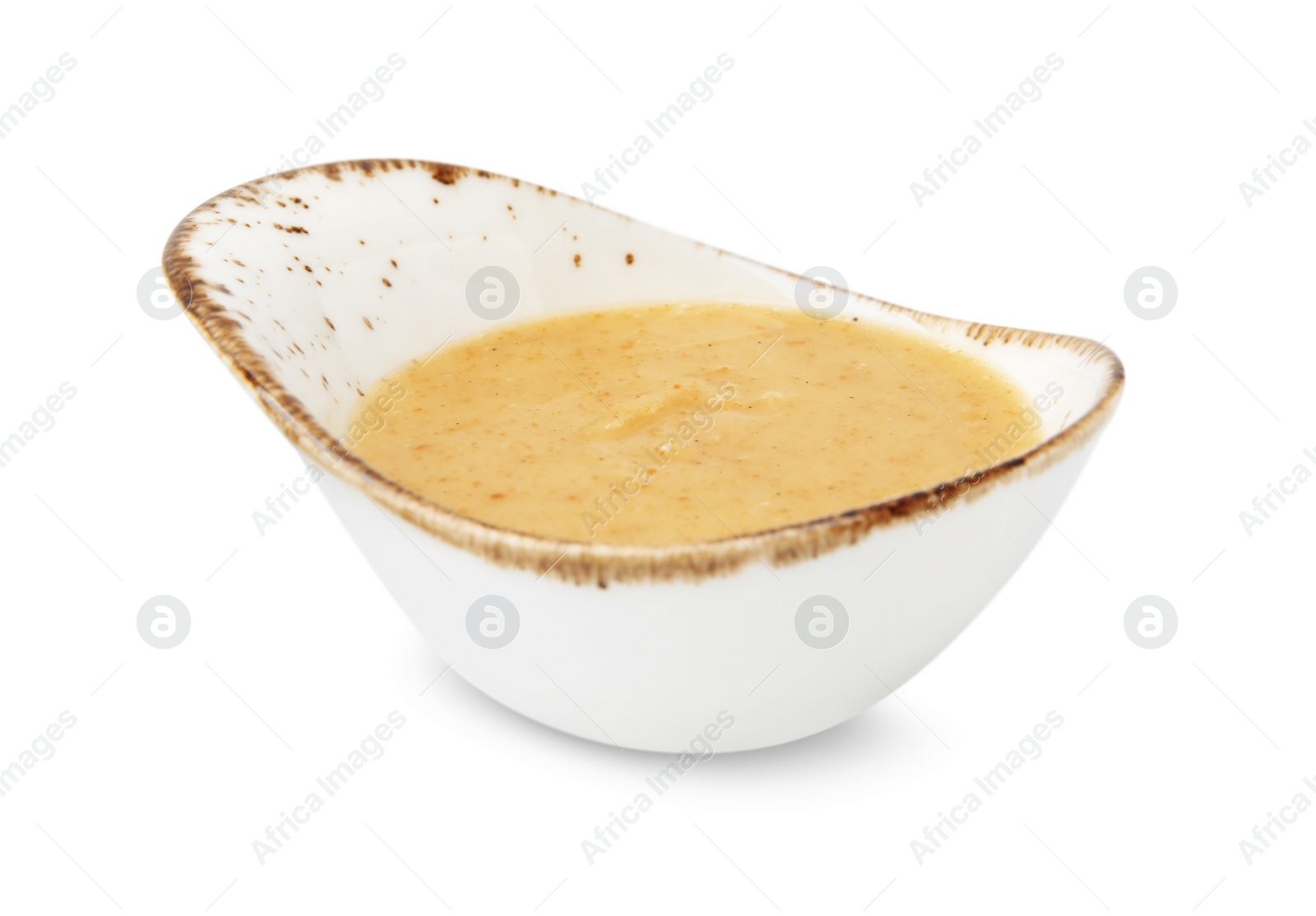 Photo of Delicious turkey gravy in sauce boat isolated on white