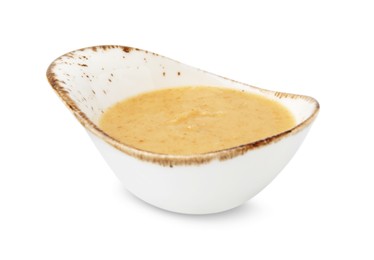 Photo of Delicious turkey gravy in sauce boat isolated on white