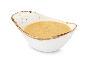 Delicious turkey gravy in sauce boat isolated on white