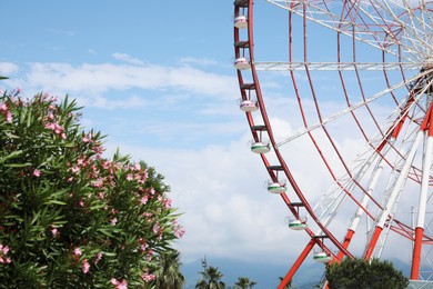 Photo of Beautiful large Ferris wheel outdoors on sunny day