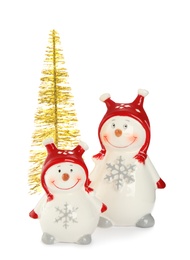 Photo of Decorative snowmen and Christmas tree on white background