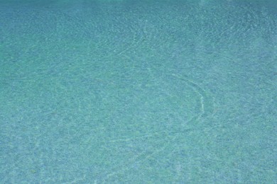 Photo of Calm clear water in swimming pool outdoors