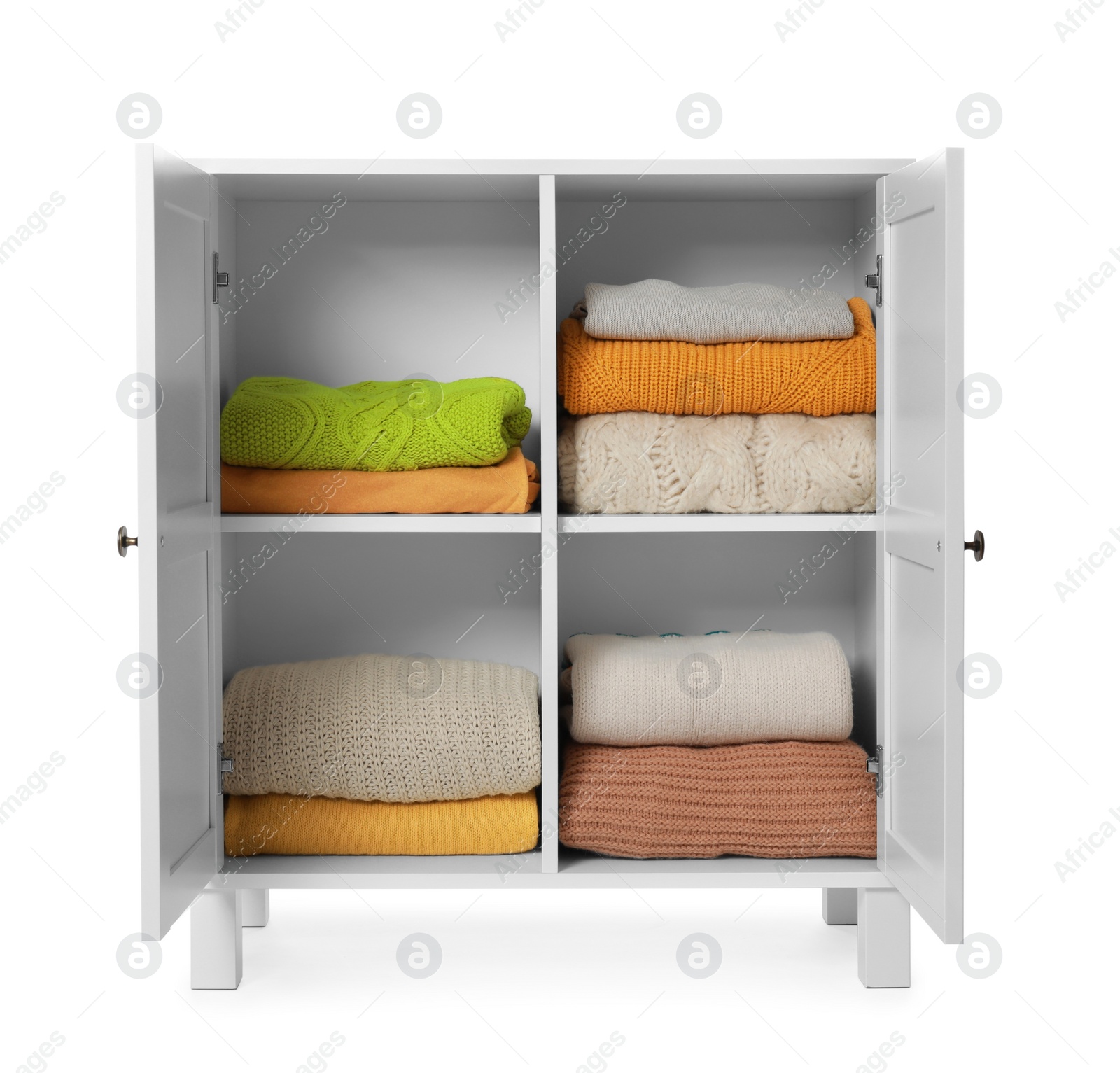 Photo of Wooden cabinet with clothes on white background. Stylish furniture for wardrobe room