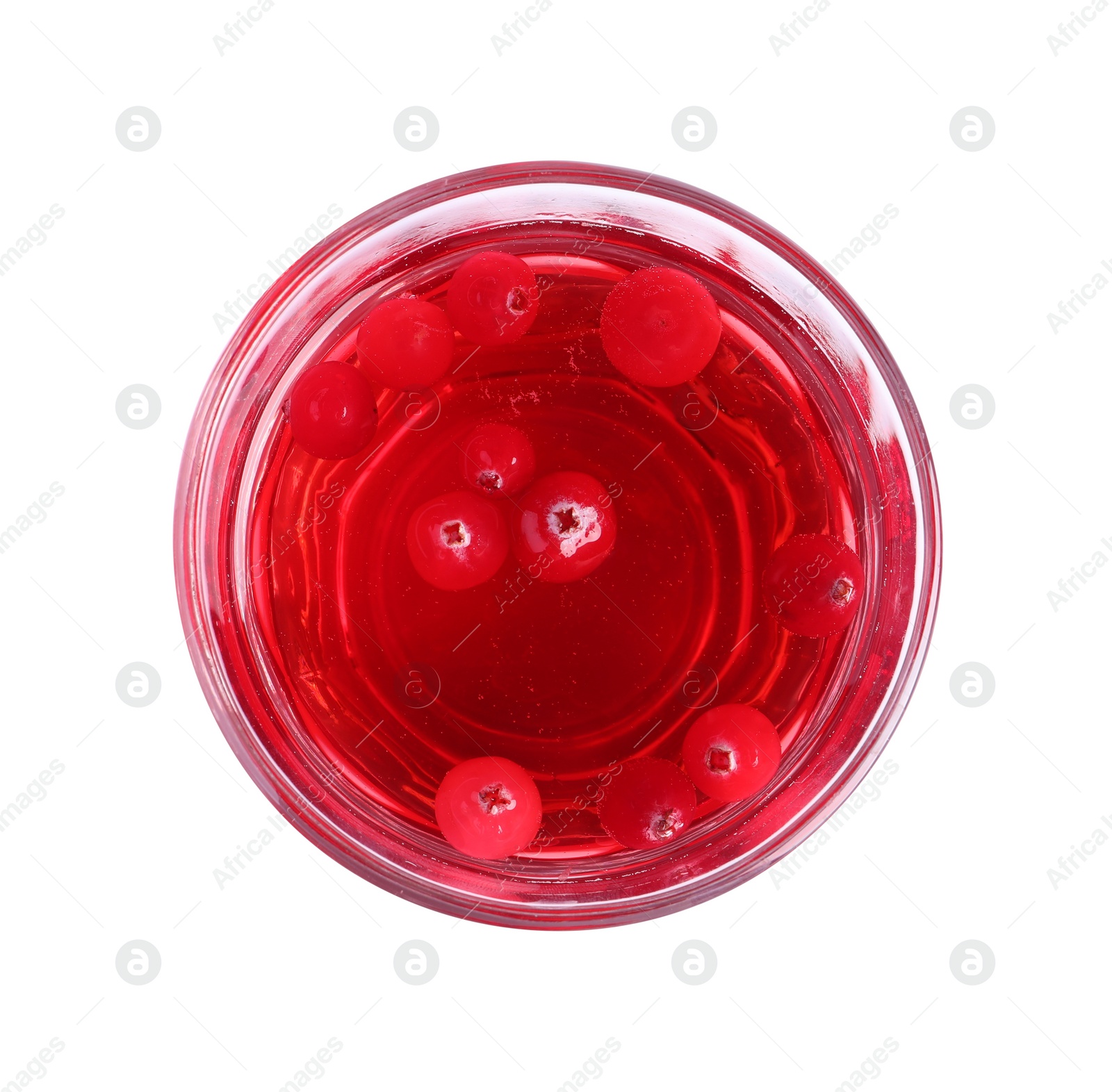 Photo of Tasty refreshing cranberry juice in glass isolated on white, top view