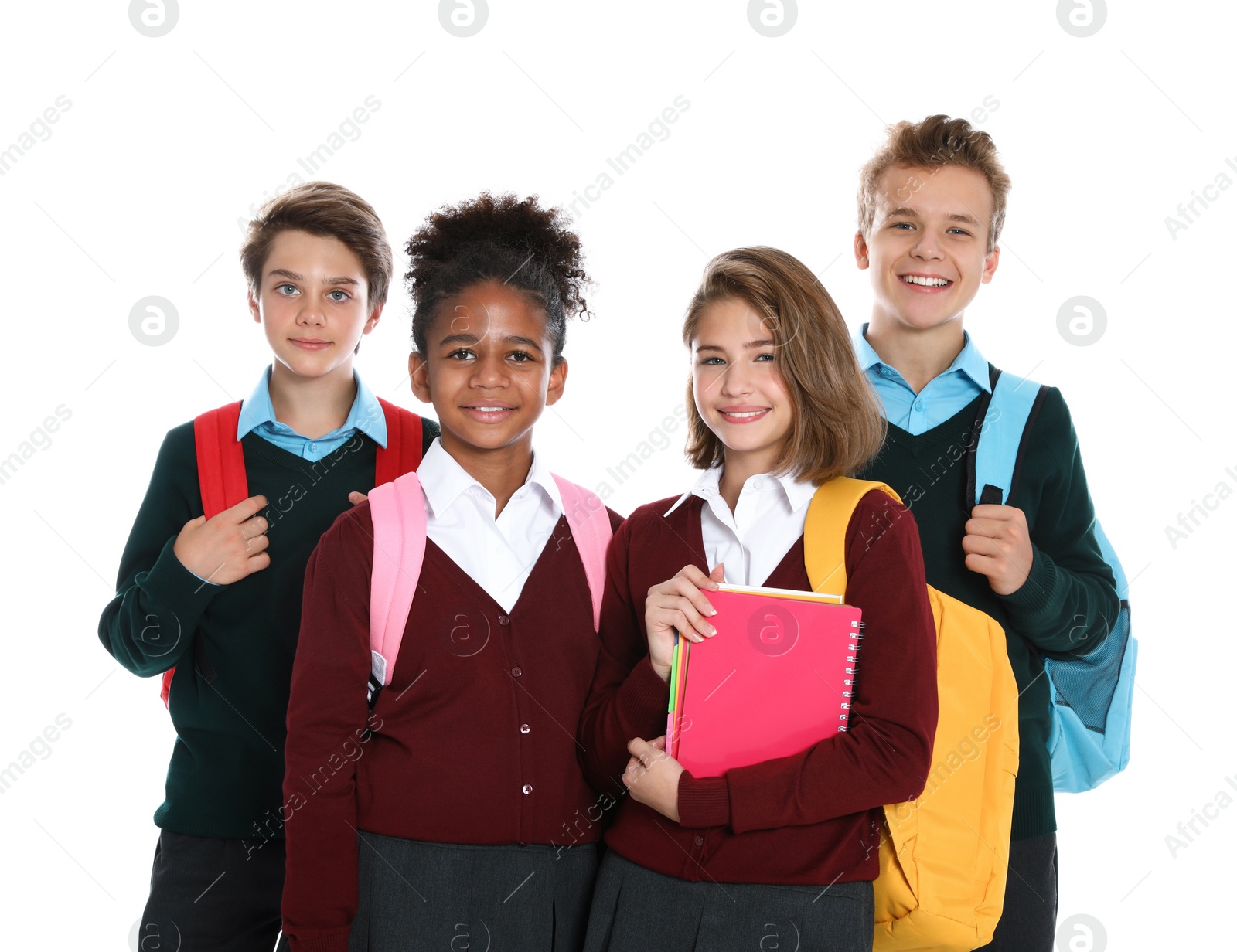 Photo of Happy pupils in school uniform on white background