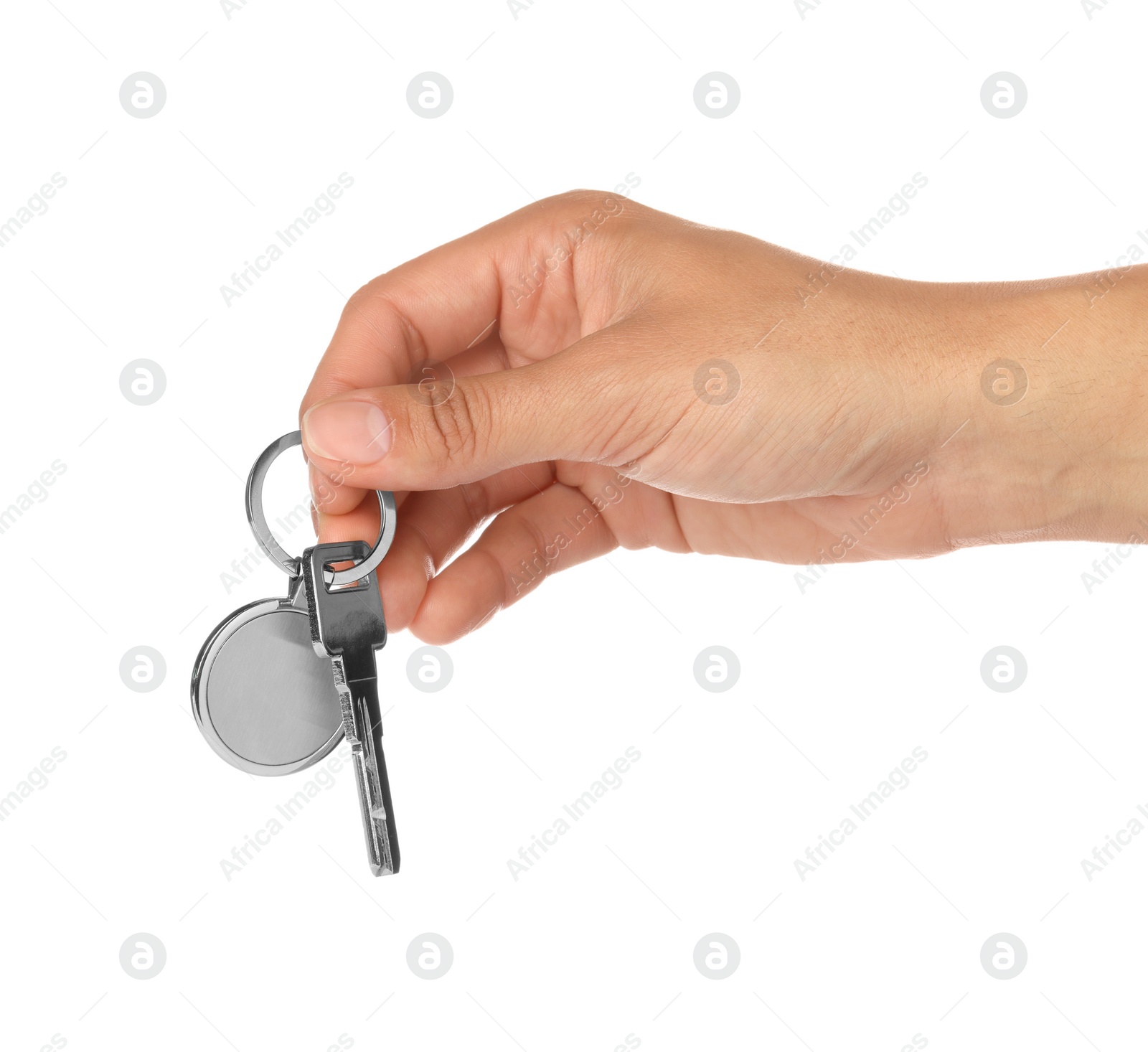 Photo of Woman holding key with metallic keychain on white background, closeup