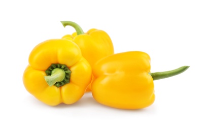 Photo of Ripe yellow bell peppers isolated on white