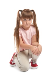 Photo of Full length portrait of little girl suffering from knee problems on white background