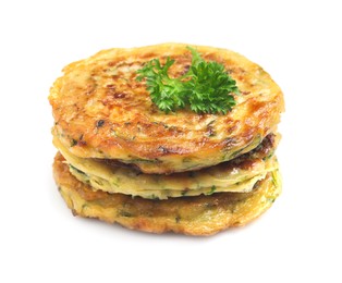 Photo of Delicious zucchini fritters with curly parsley on white background