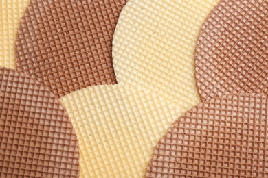 Tasty wafers as background, closeup. Crispy food