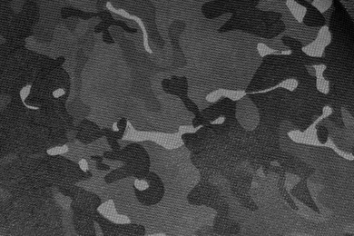 Image of Texture of camouflage fabric as background, top view. Black and white effect