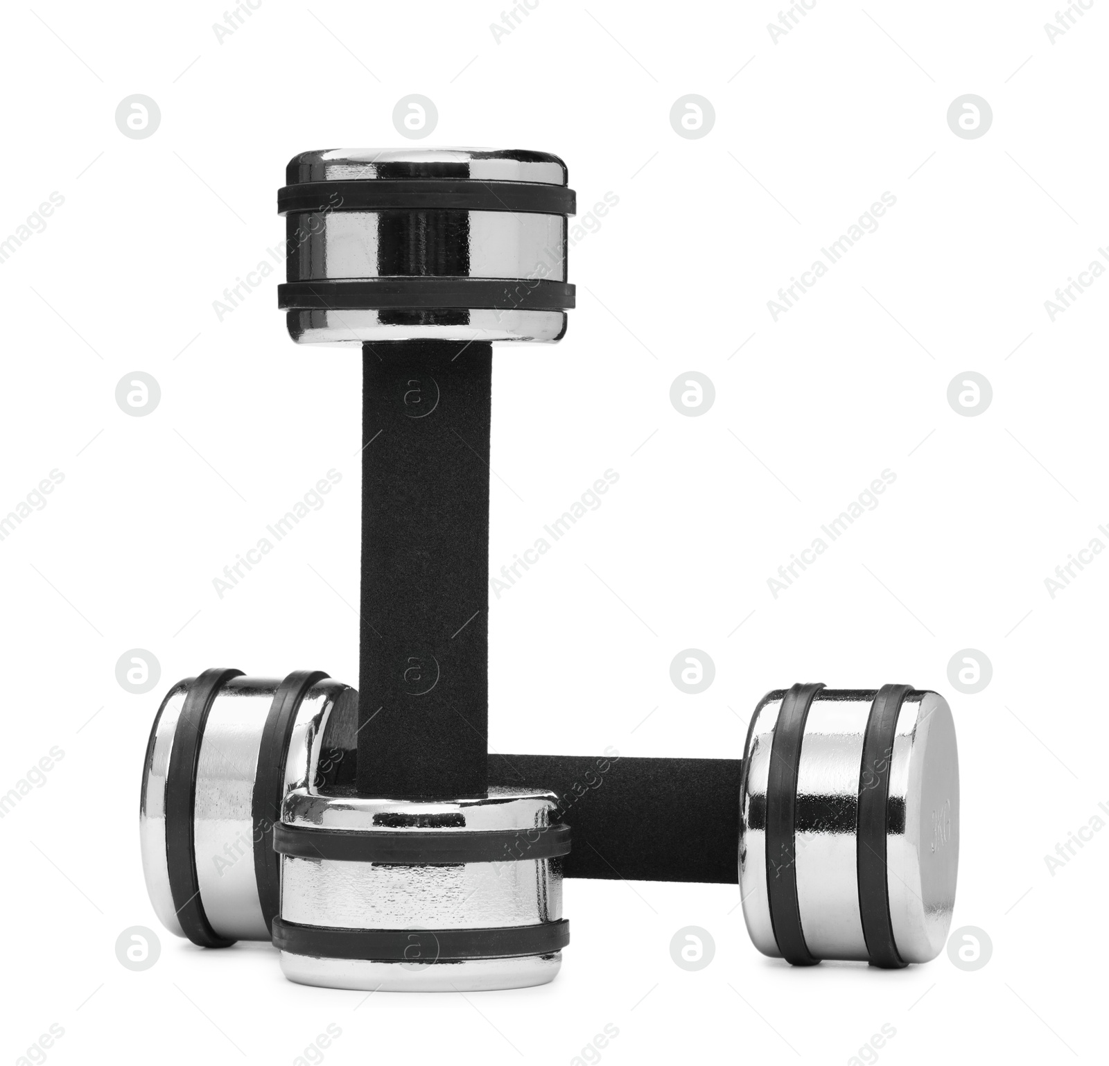 Photo of Metal dumbbells isolated on white. Sports equipment