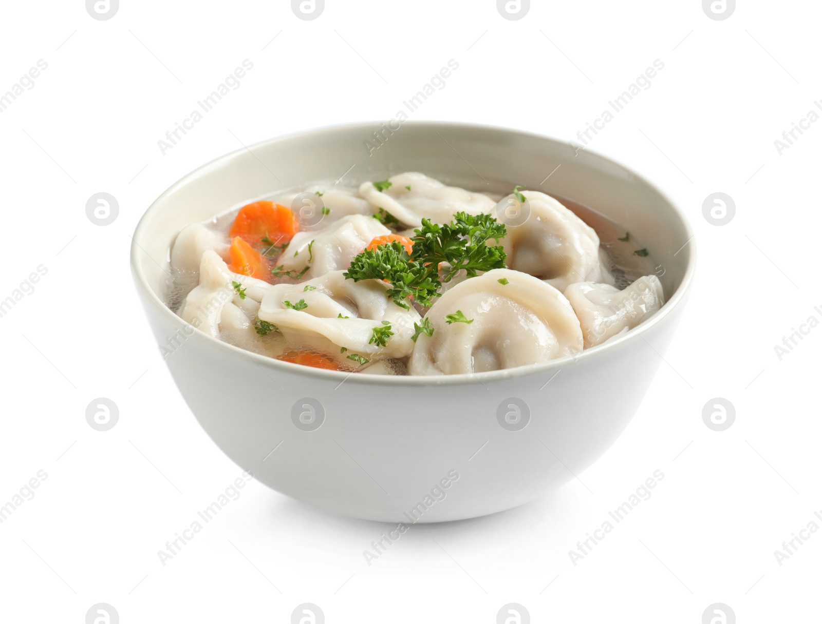 Photo of Bowl of tasty dumplings in broth isolated on white