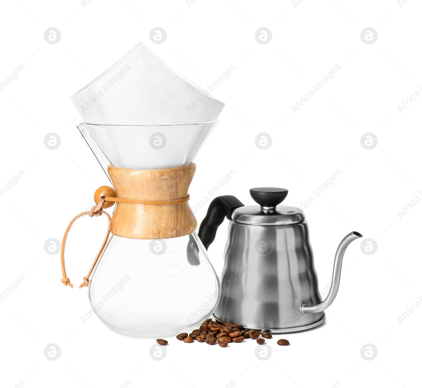 Photo of Glass chemex coffeemaker with paper coffee filter, kettle and beans isolated on white