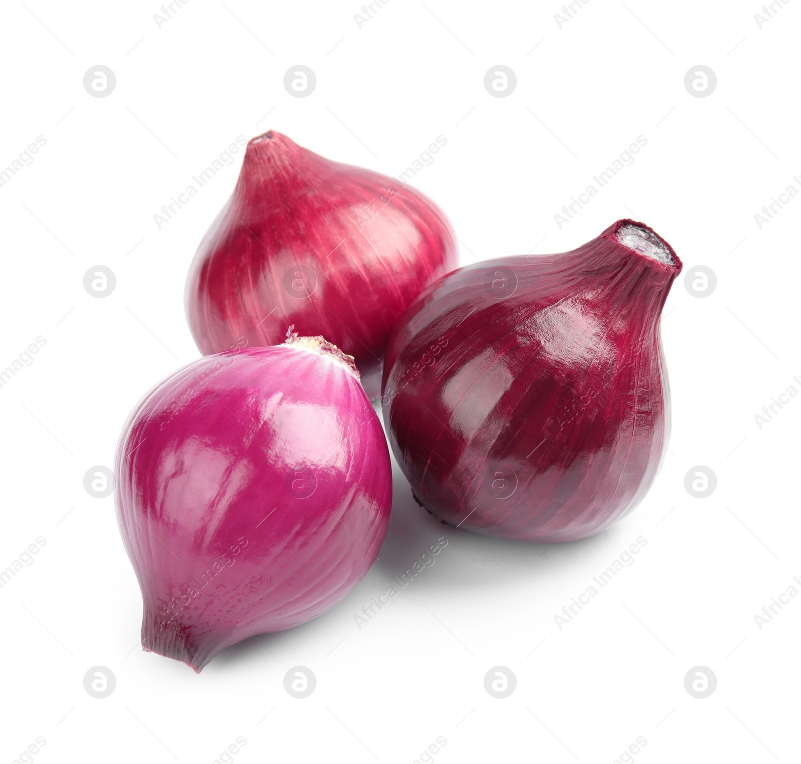 Photo of Ripe red onions on white background