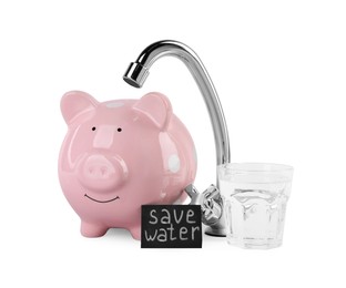 Photo of Water scarcity concept. Card with phrase Save Water, piggy bank, tap and glass of drink isolated on white