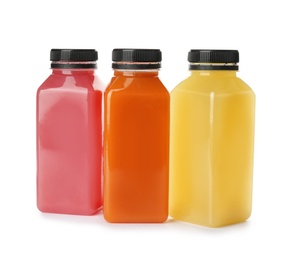 Photo of Bottles with fresh juices on white background