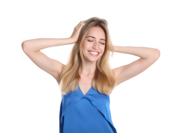 Portrait of beautiful young woman with blonde hair on white background