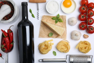Photo of Flat lay composition with wine and fresh ingredients on white background