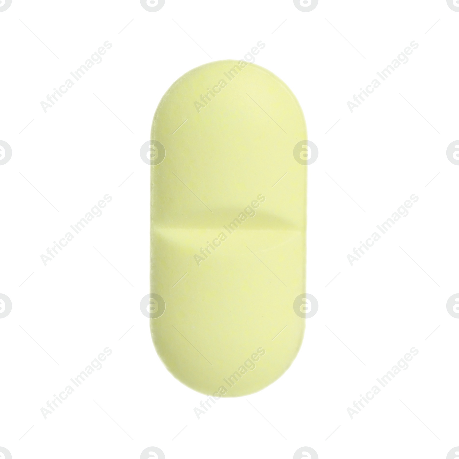 Photo of One light green pill on white background. Medicinal treatment