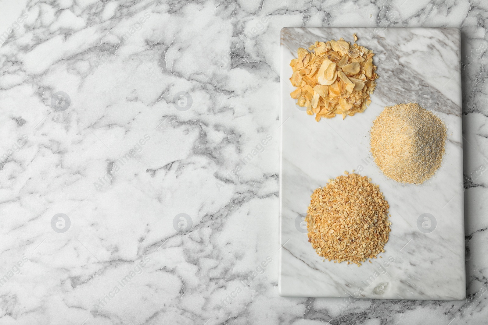 Photo of Flat lay composition with garlic products on marble background