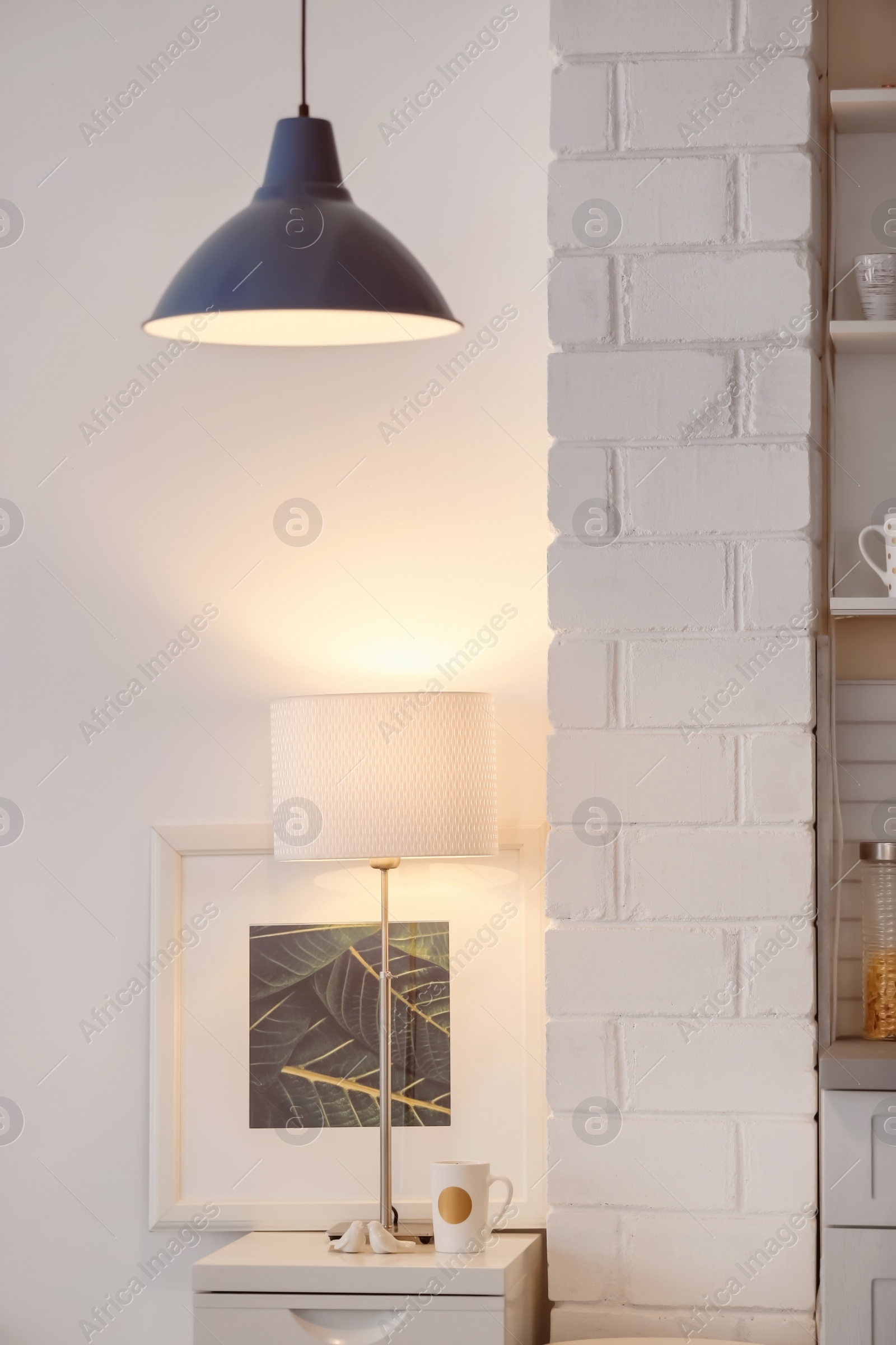 Photo of Modern room interior with stylish lamp