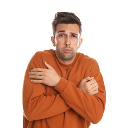 Photo of Young man suffering from cold on white background