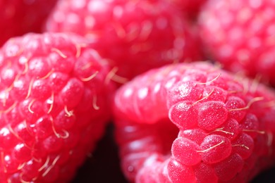 Tasty fresh ripe raspberries as background, macro view