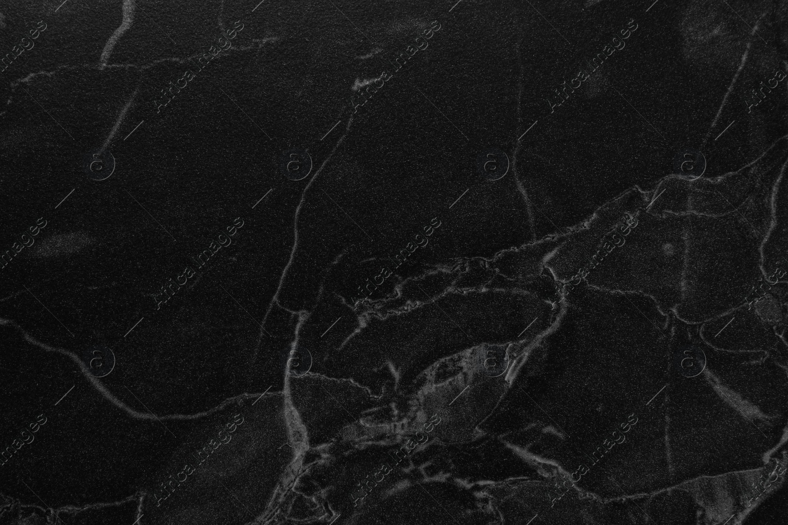 Photo of Black marble surface as background, closeup view