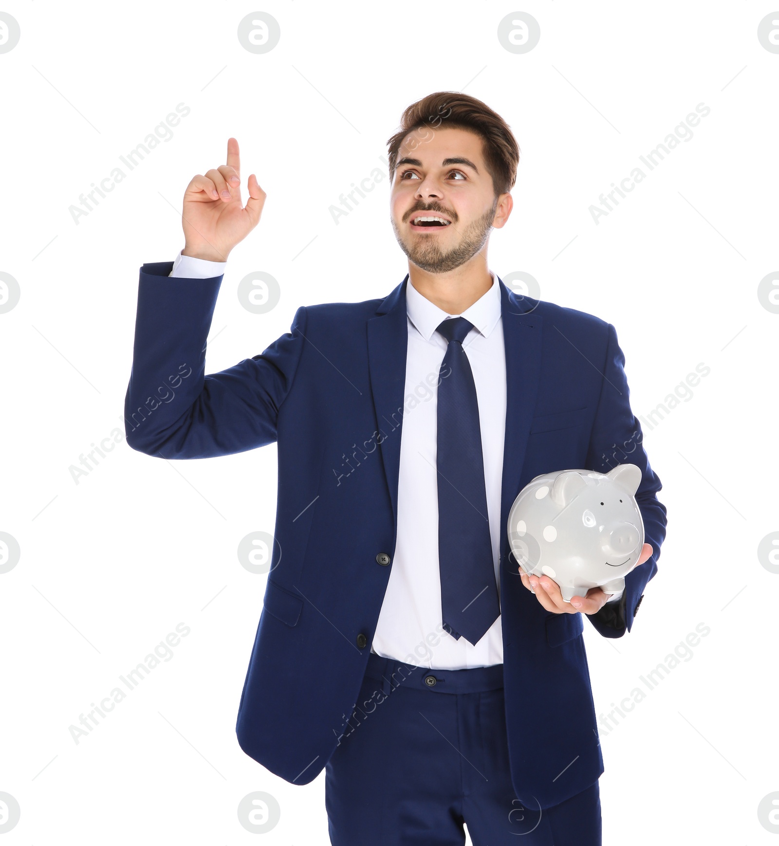 Photo of Young businessman with piggy bank on white background
