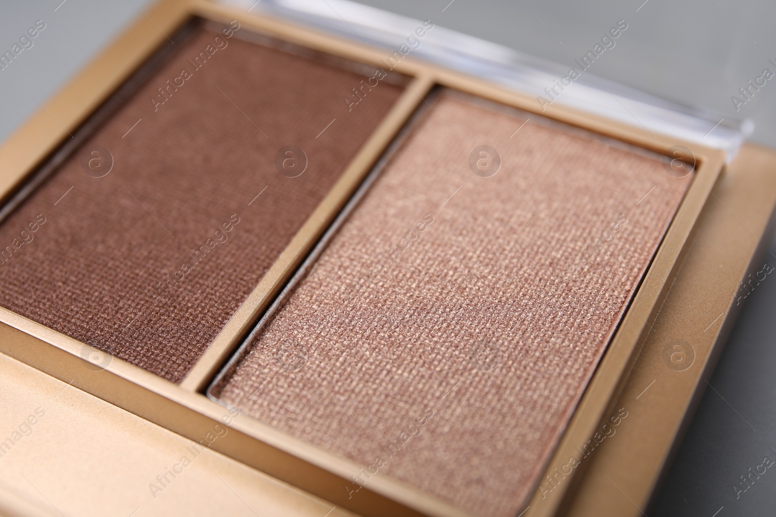 Photo of Beautiful eyeshadow palette as background, closeup. Professional cosmetic product