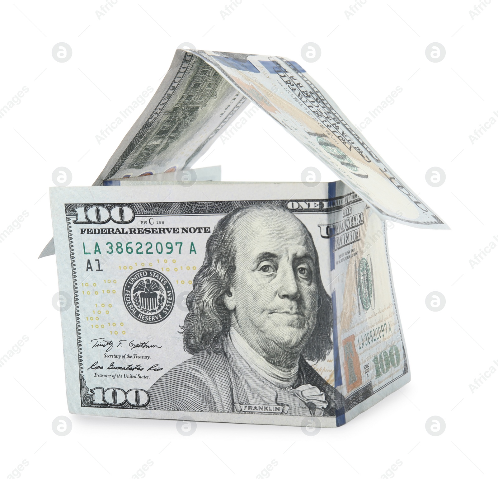 Photo of House model made of money on white background