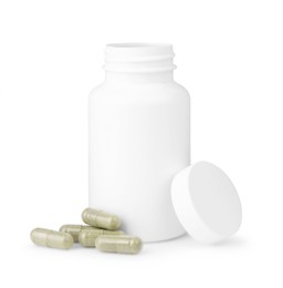 Photo of Jar with vitamin capsules isolated on white