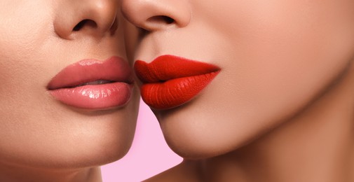 Closeup view of girls kissing each other. Lesbian couple