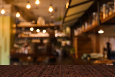 Empty wooden surface in cafe. Space for design