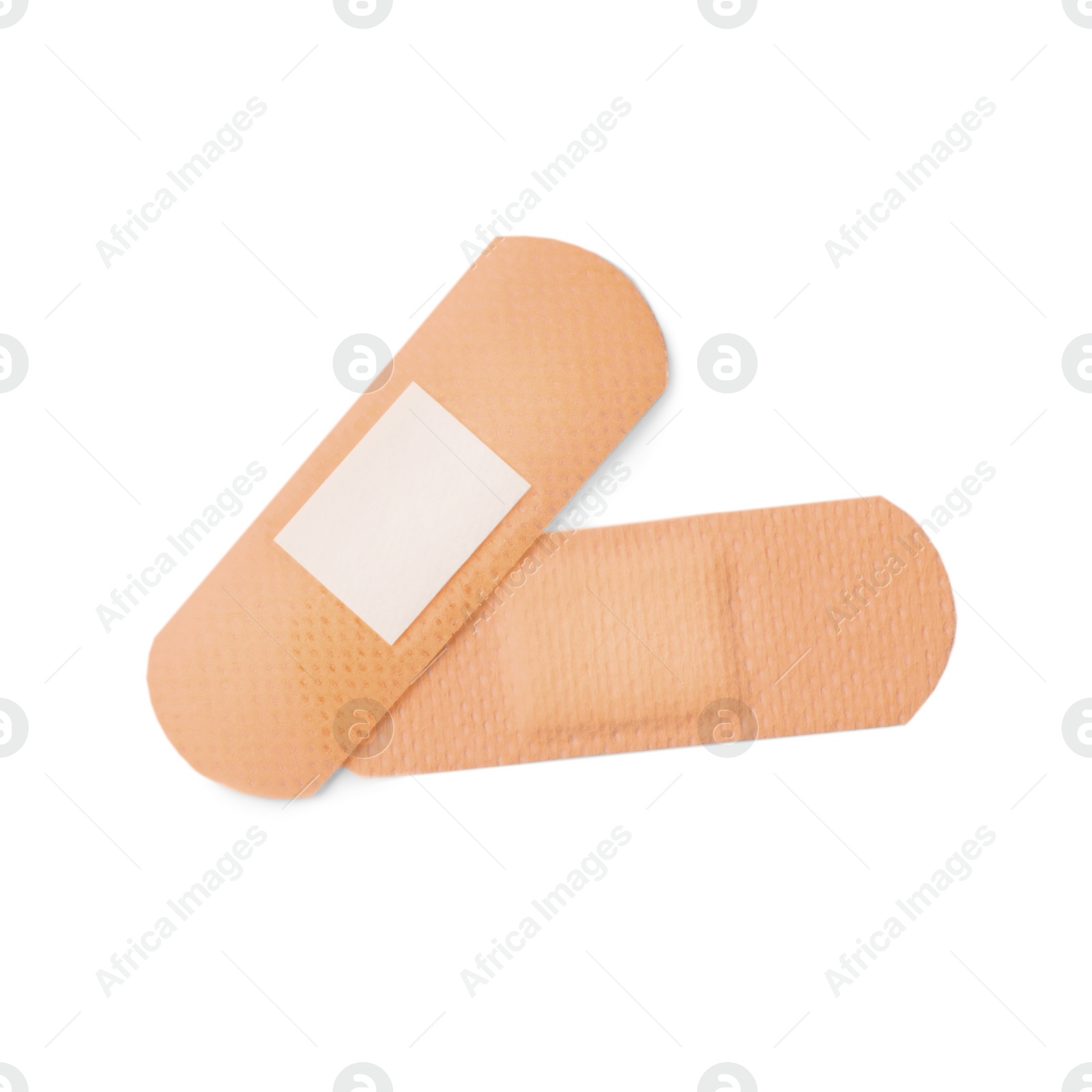 Medical sticking plasters isolated on white. First aid item Photo of Medical sticking plasters isolated on white. First aid item