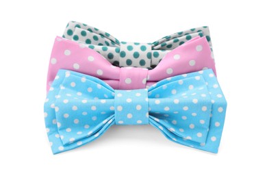 Different stylish bow ties on white background