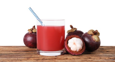 Photo of Delicious mangosteen juice and fresh fruits on wooden table against white background