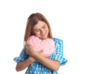 Photo of Portrait of woman with decorative heart shaped pillow on white background