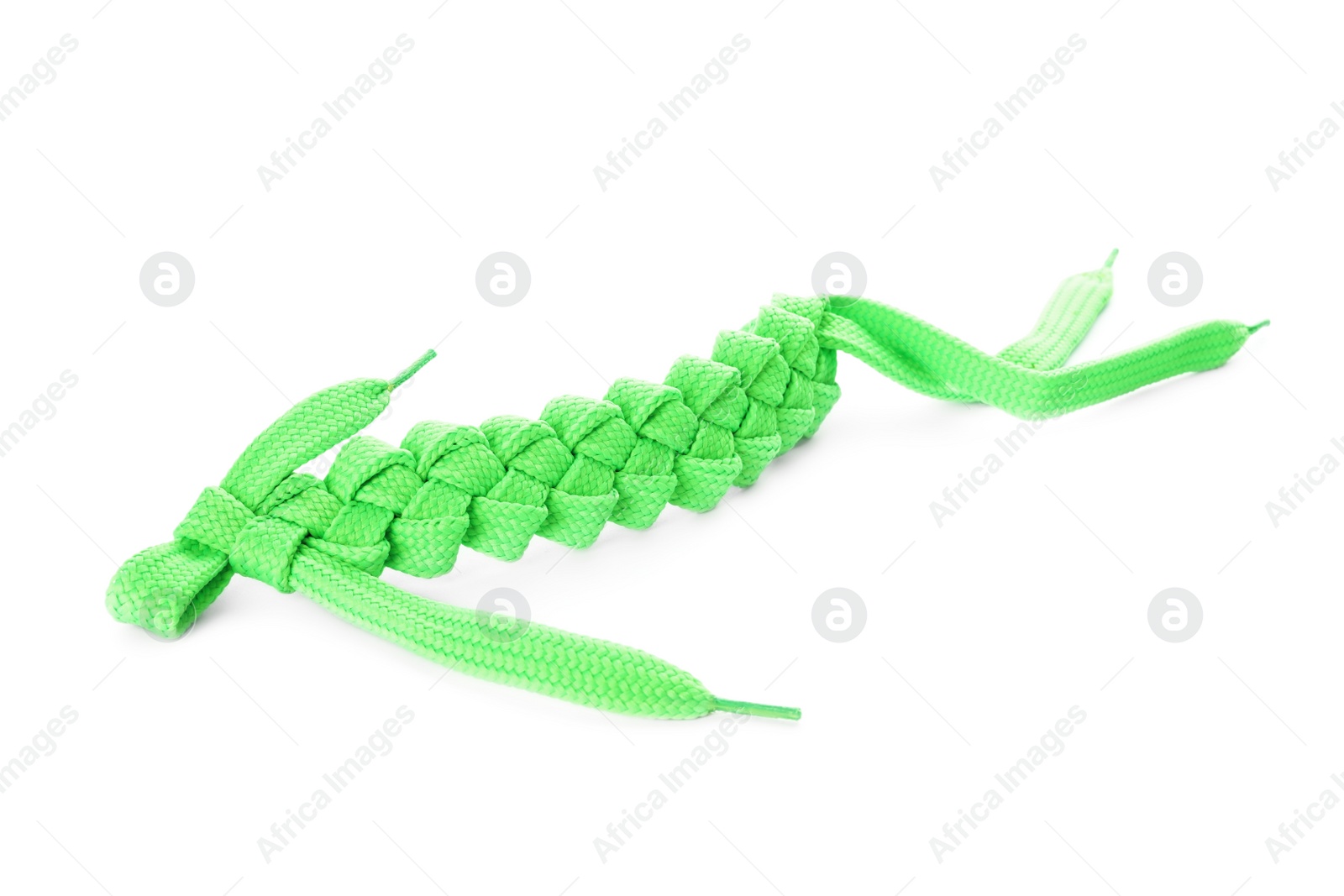 Photo of Decorative knot made of mint shoe laces isolated on white