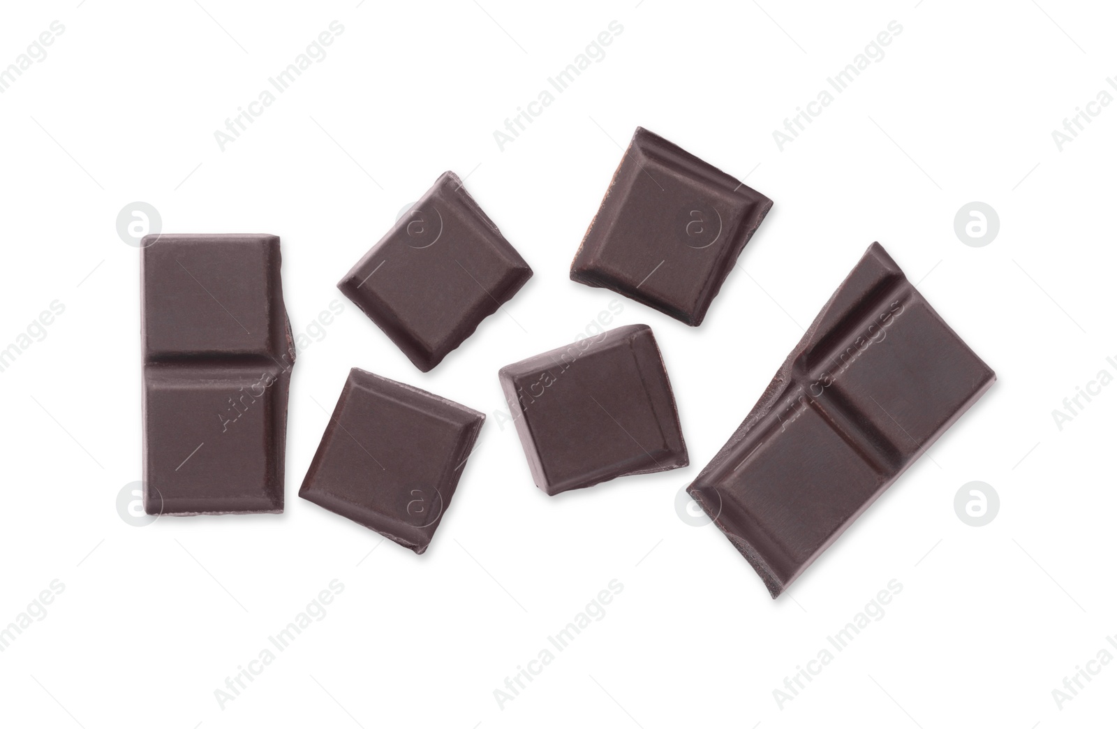 Photo of Pieces of delicious dark chocolate bar on white background, top view