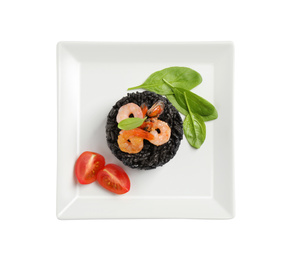 Delicious black risotto with seafood isolated on white, top view