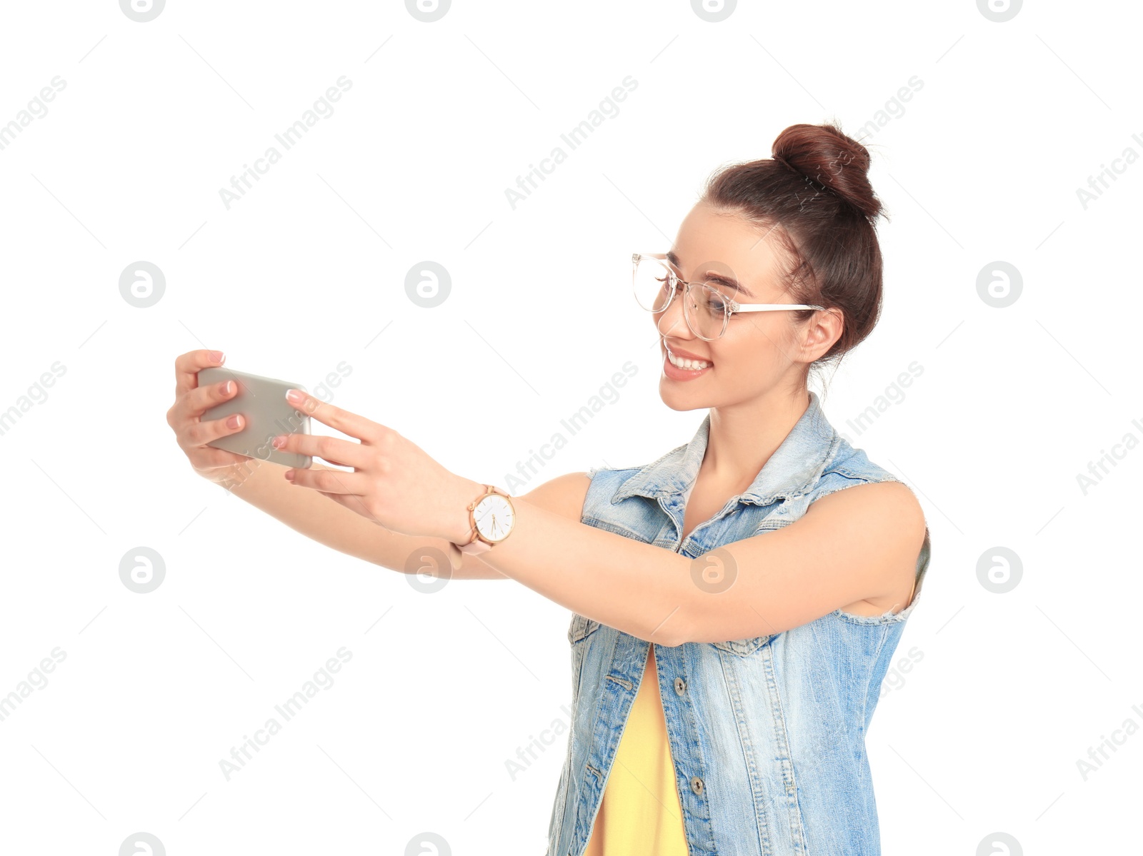 Photo of Young beautiful woman taking selfie against white background