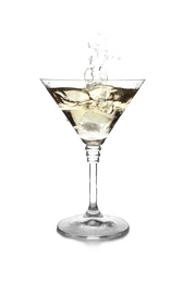 Glass of classic martini with splash on white background