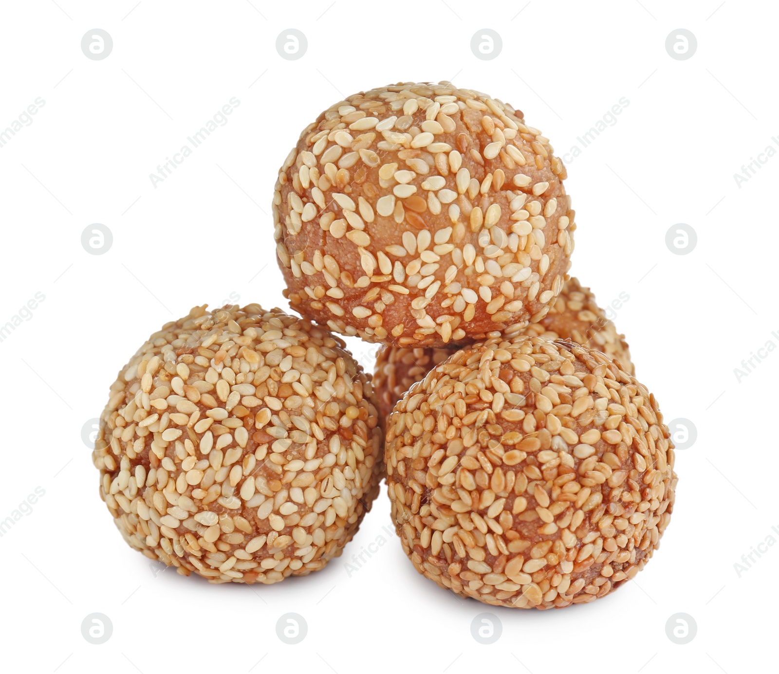 Photo of Many delicious sesame balls on white background