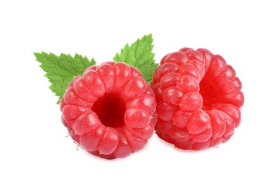 Fresh ripe raspberries and green leaves isolated on white