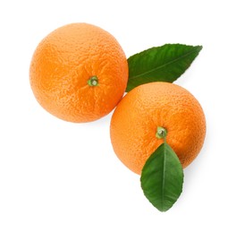 Photo of Fresh ripe oranges with green leaves on white background, top view