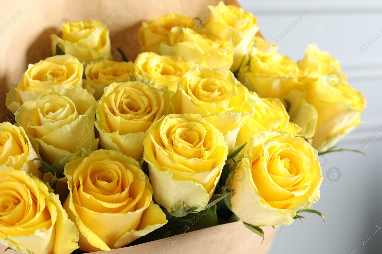 Photo of Beautiful bouquet of yellow roses, closeup view