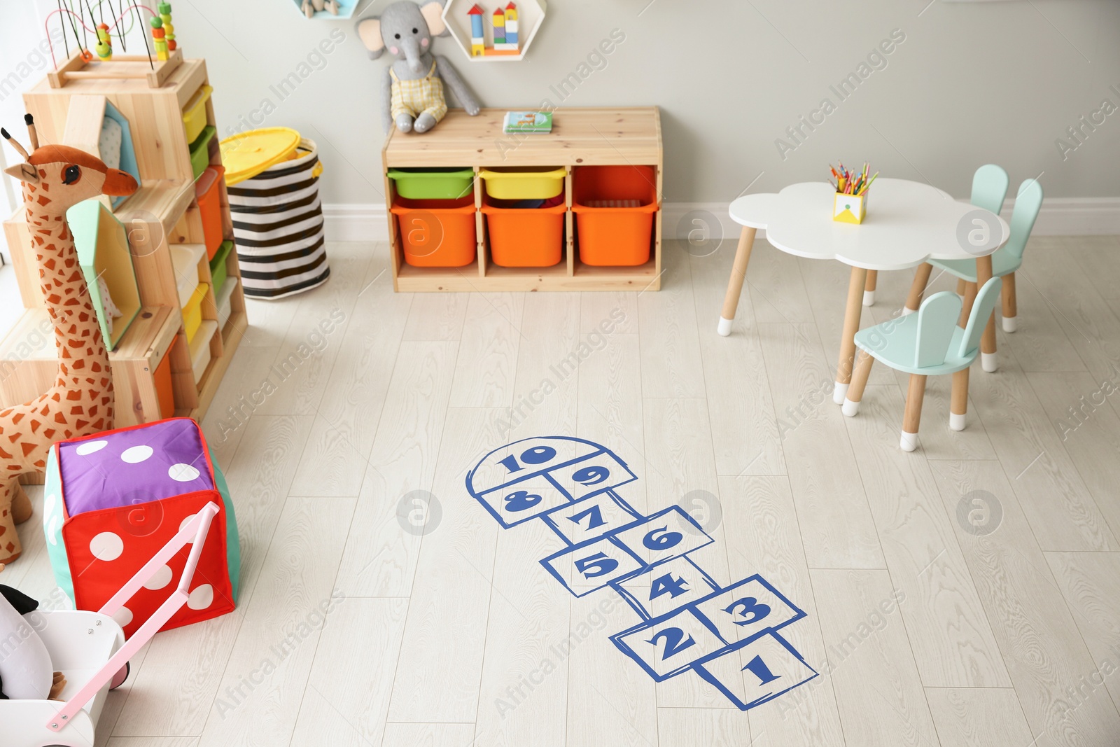 Photo of Blue hopscotch floor sticker in playing room