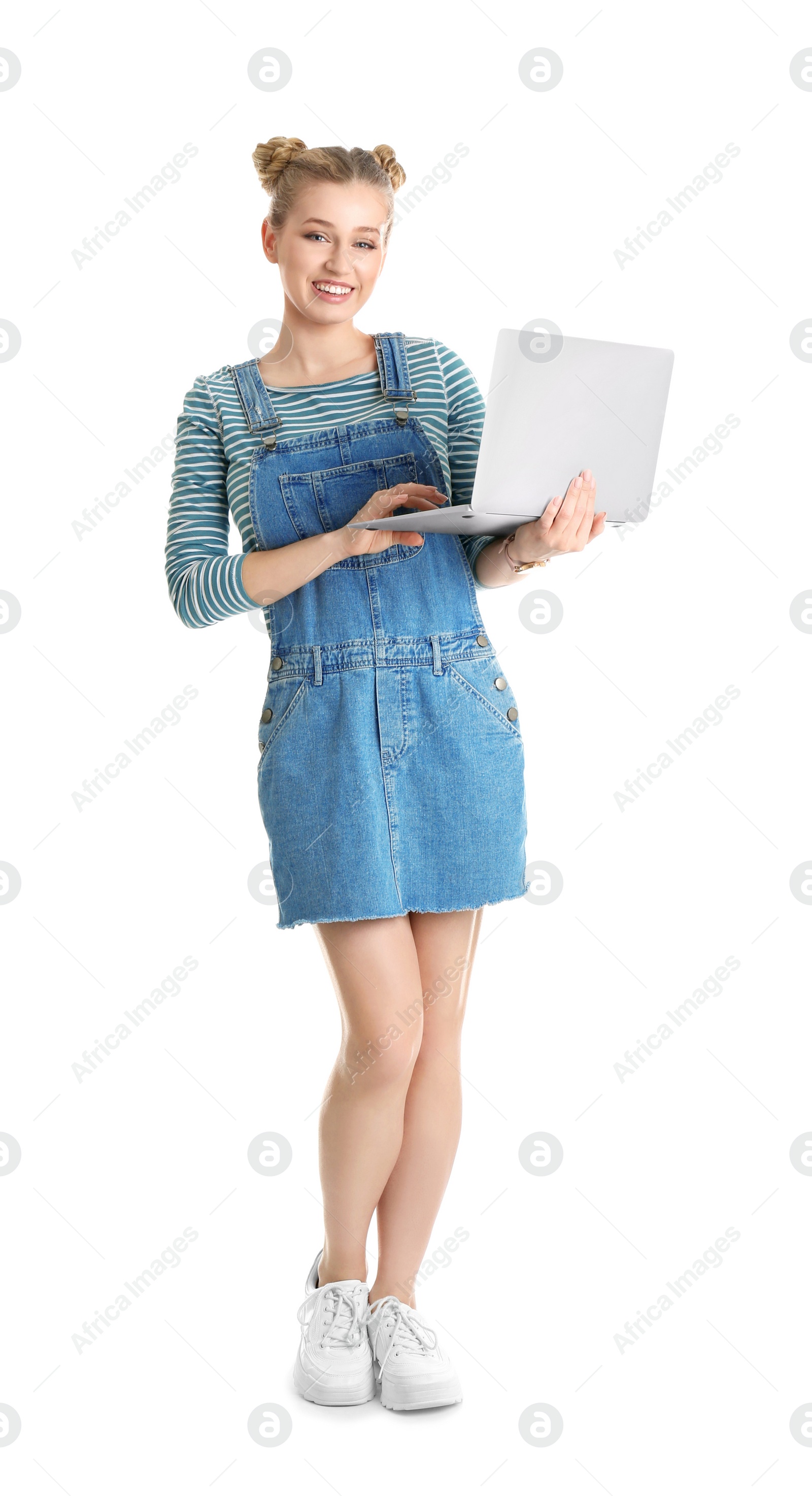 Photo of Full length portrait of young woman with laptop isolated on white